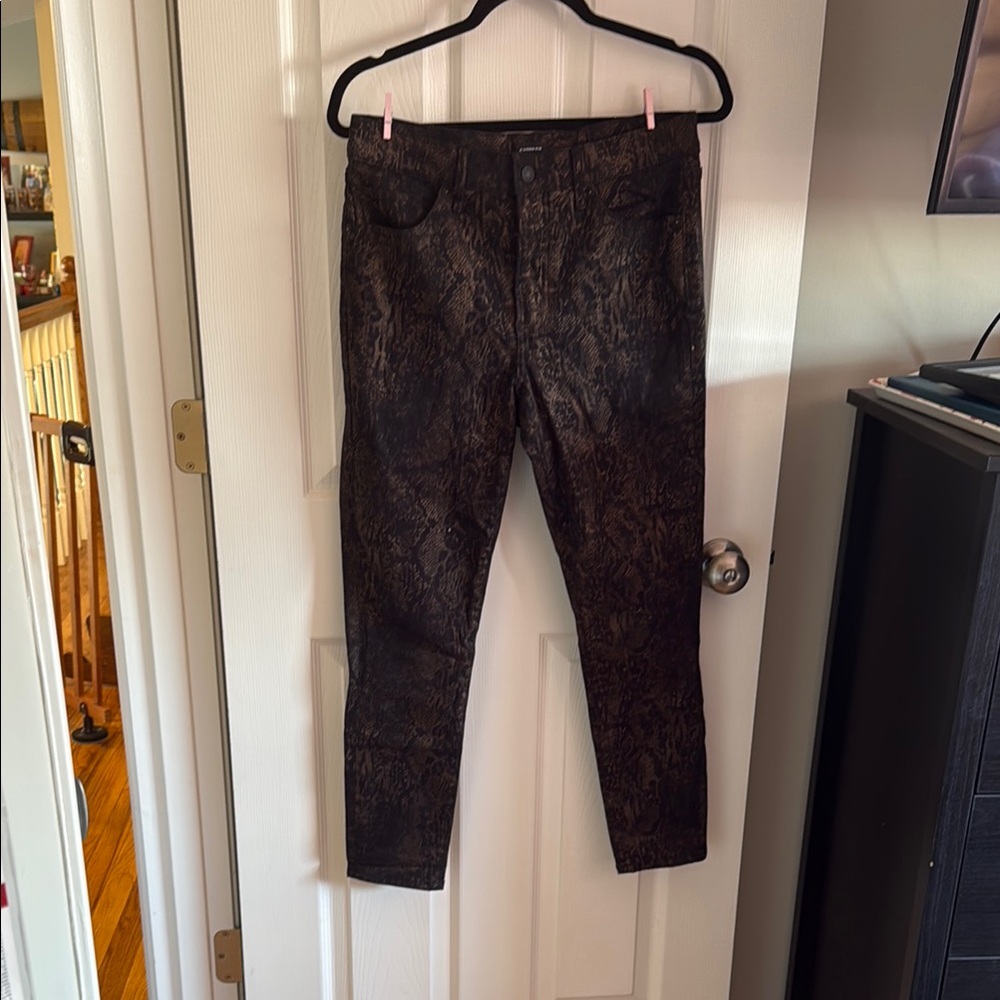 Black pants with snake like glittery pattern